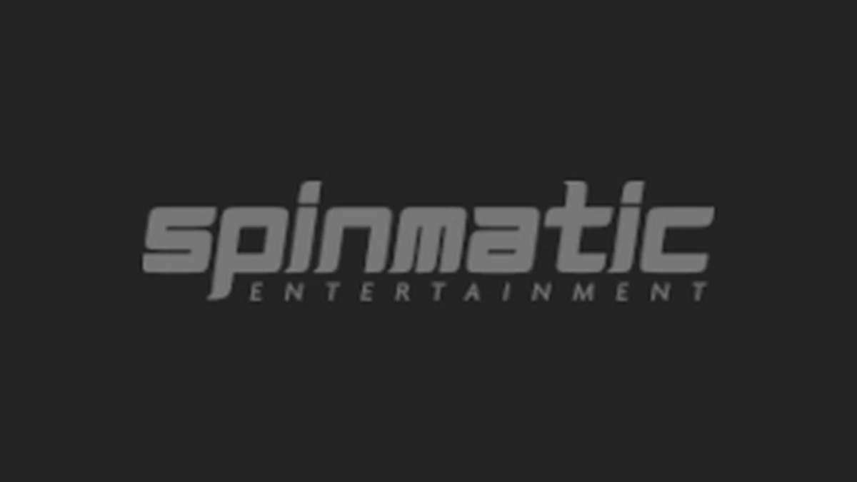 Large Spinmatic wordmark filling one continuous dark red background